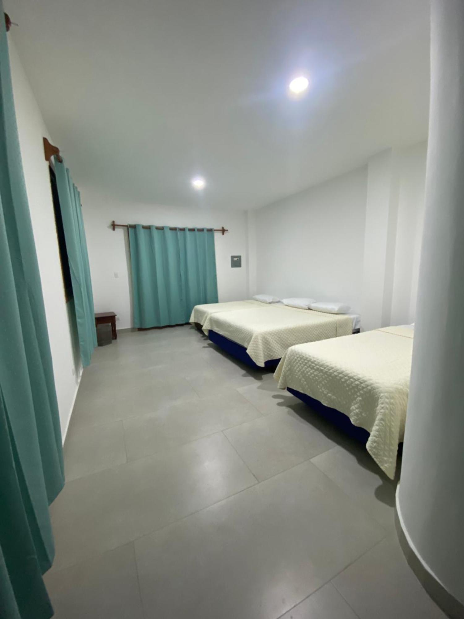 Penguin House Hotel Puerto Villamil Exterior photo